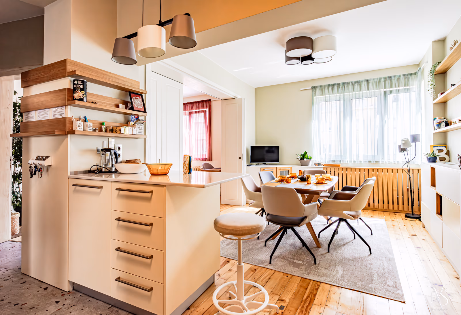 Living room from another angle — dining area and natural light